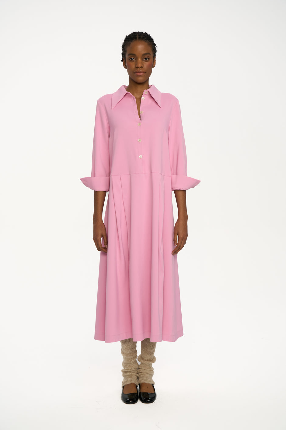 Pink collared midi shirt dress with flared skirt on model, full length front view – Inner Tiger