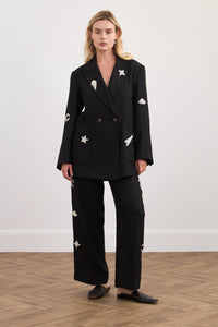 Hand-embroidered linen trousers