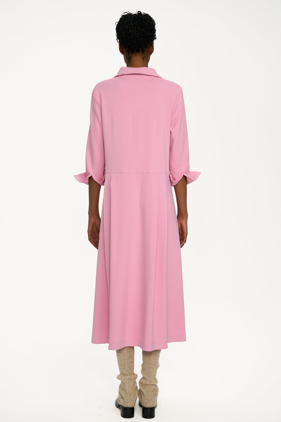 Pink collared midi shirt dress with flared skirt on model, full length front view – Inner Tiger