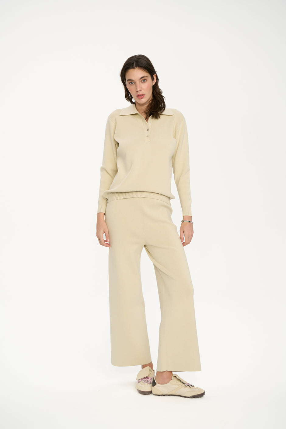 Beige knit polo and wide-leg trousers set on model, full length front view – Inner Tiger
