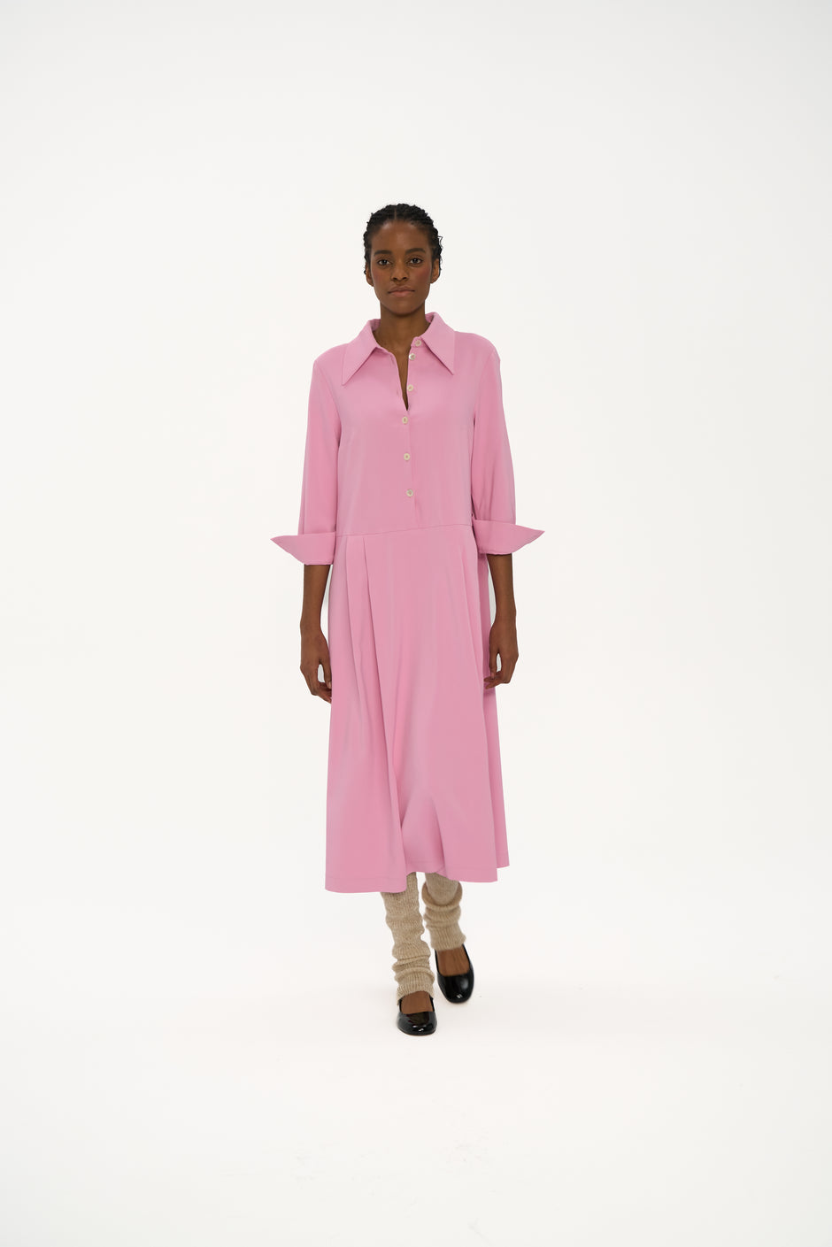 Pink collared midi shirt dress with flared skirt on model, full length front view walking – Inner Tiger