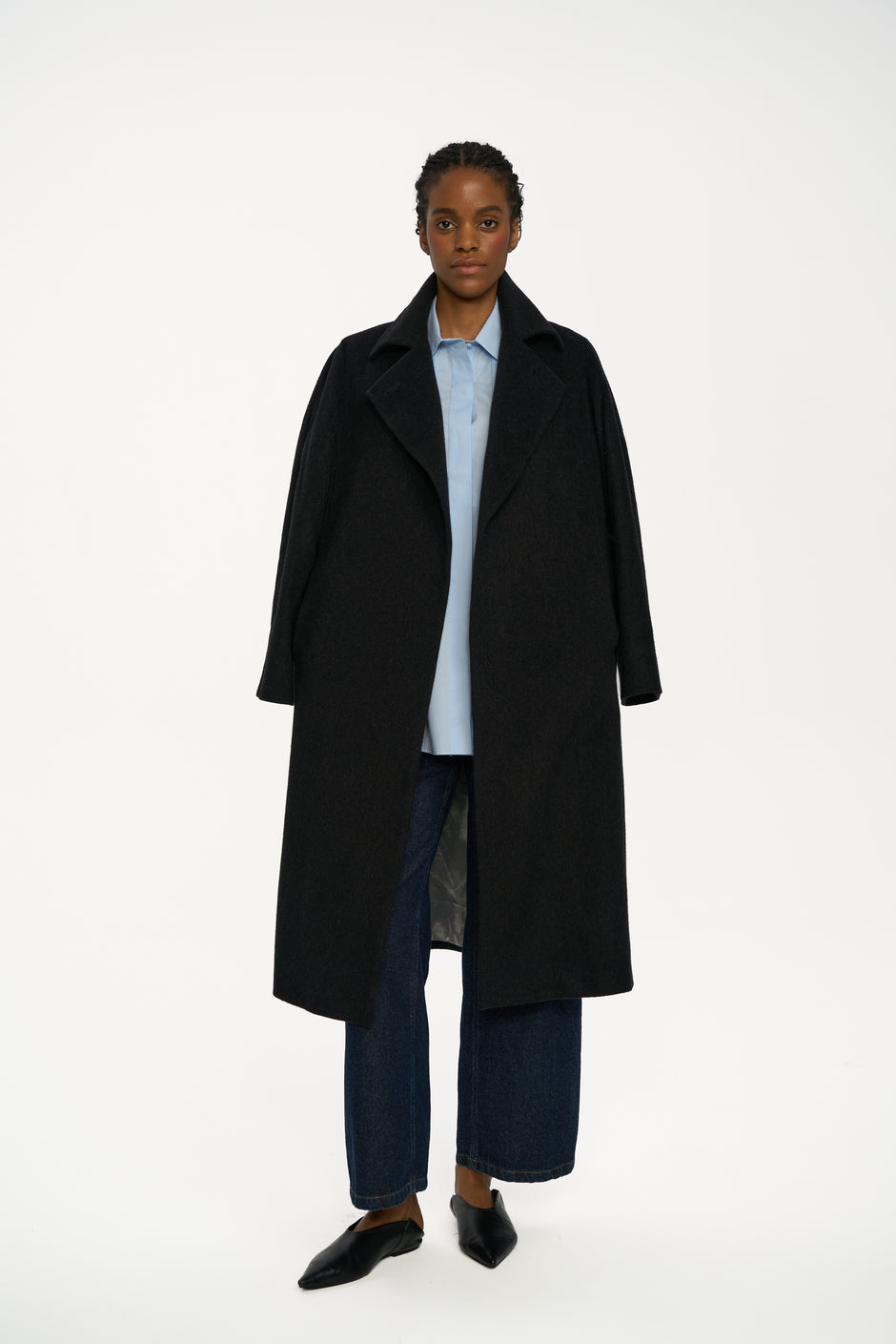 Dark grey cashmere coat in straight wrap silhouette, styled casually with jeans and pointed black flats – Inner Tiger